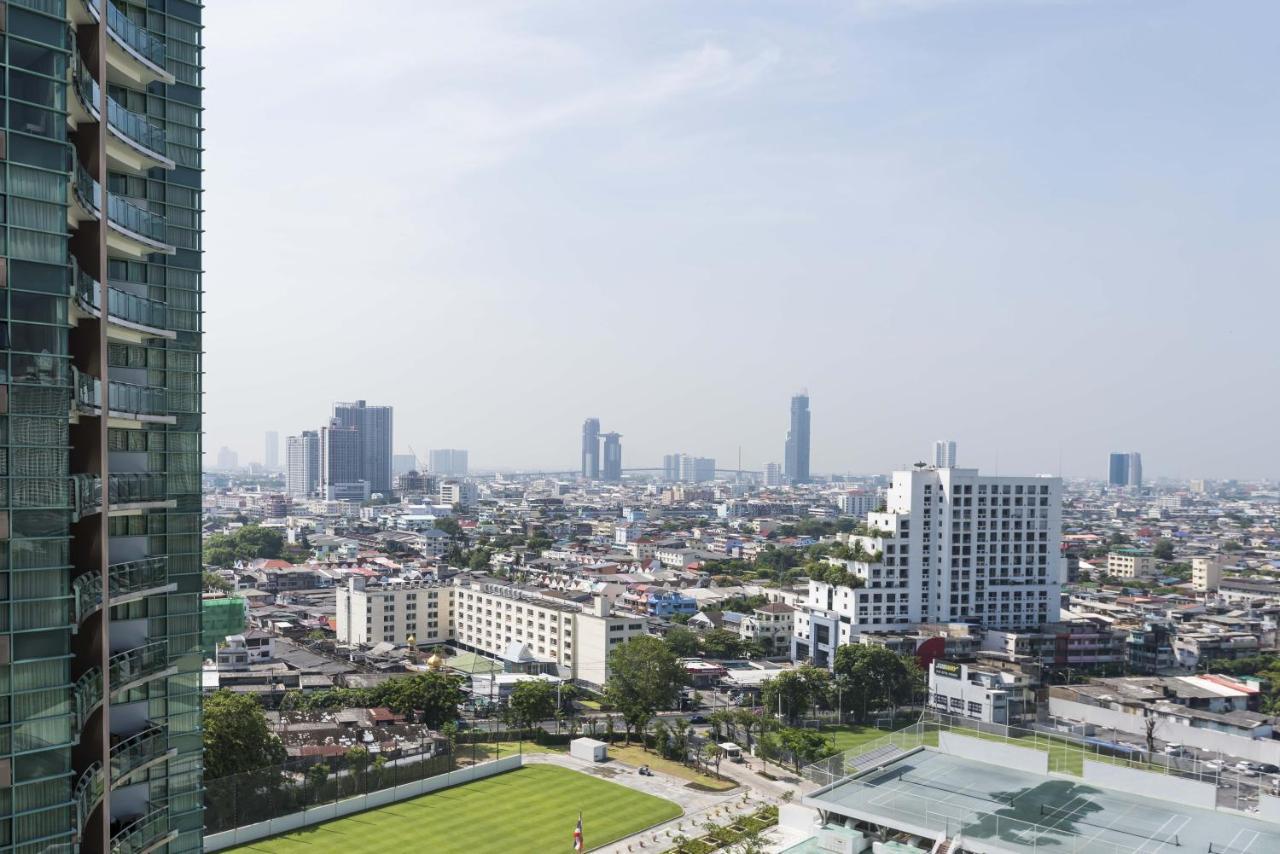 Chatrium Hotel Riverside Bangkok Zewnętrze zdjęcie View of the city from the complex